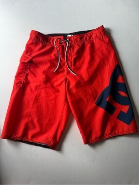 DC Men's Orange Board Shorts with Navy Logo